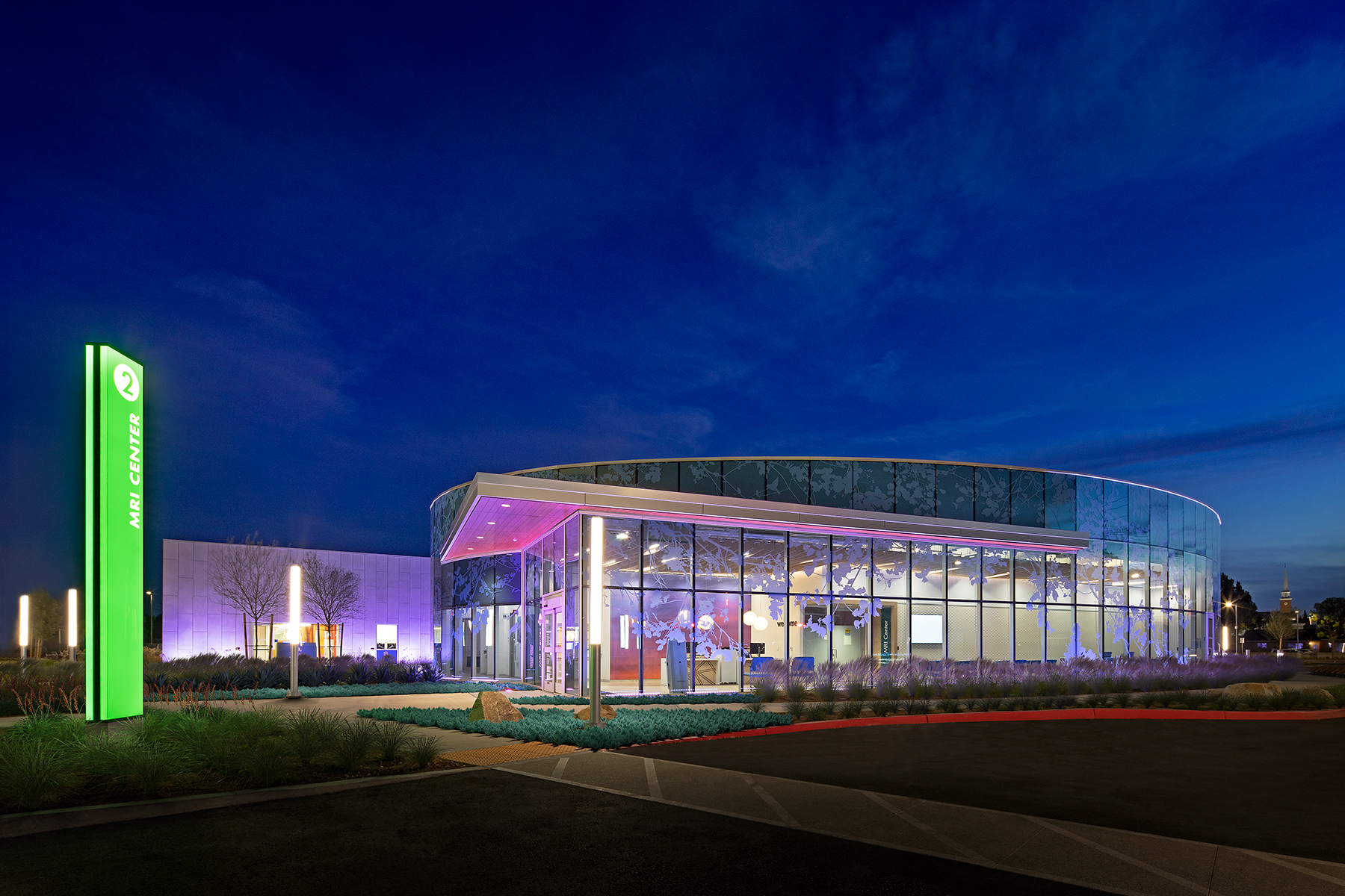 building with glass entrance at night