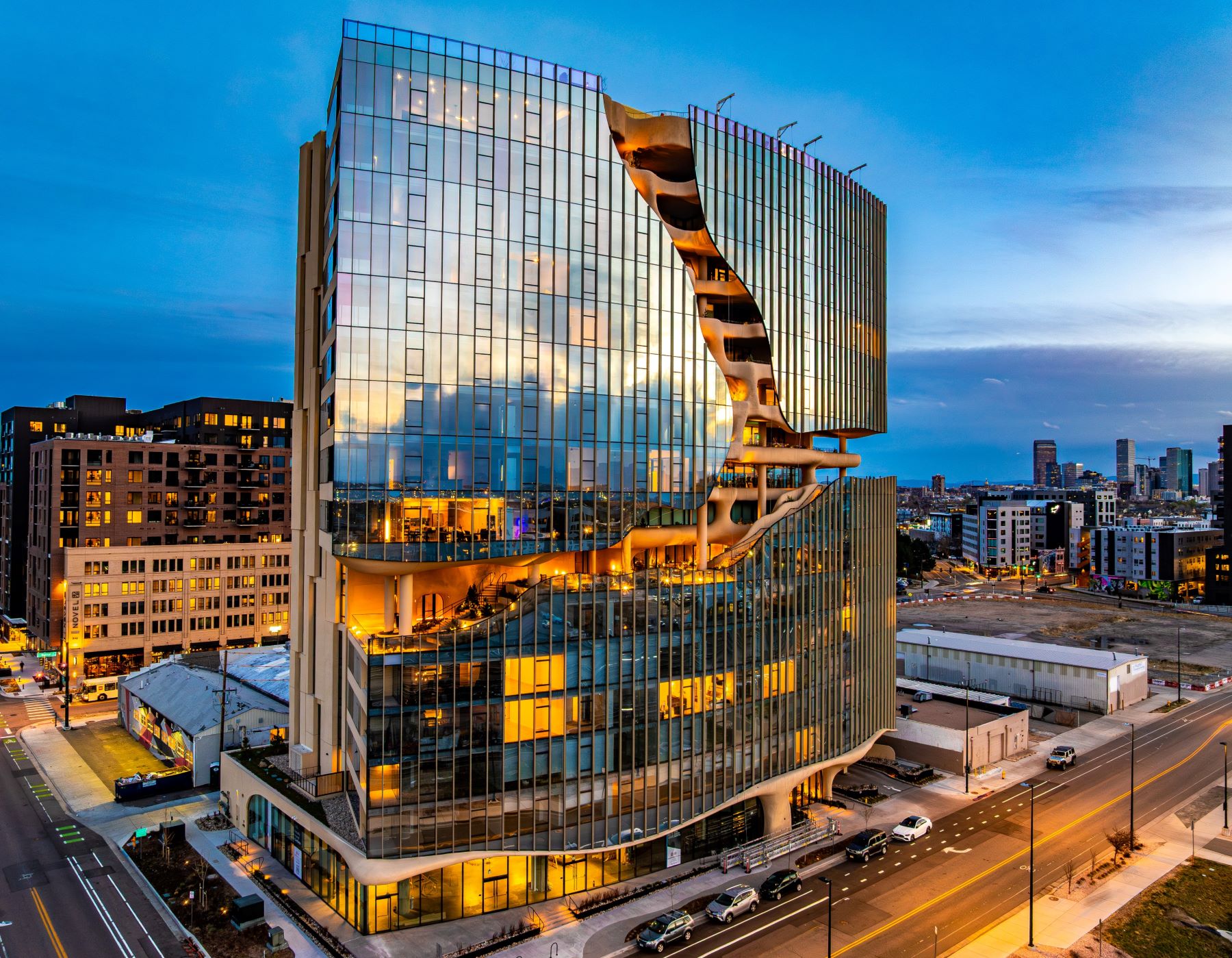 glass façade with carved canyon
