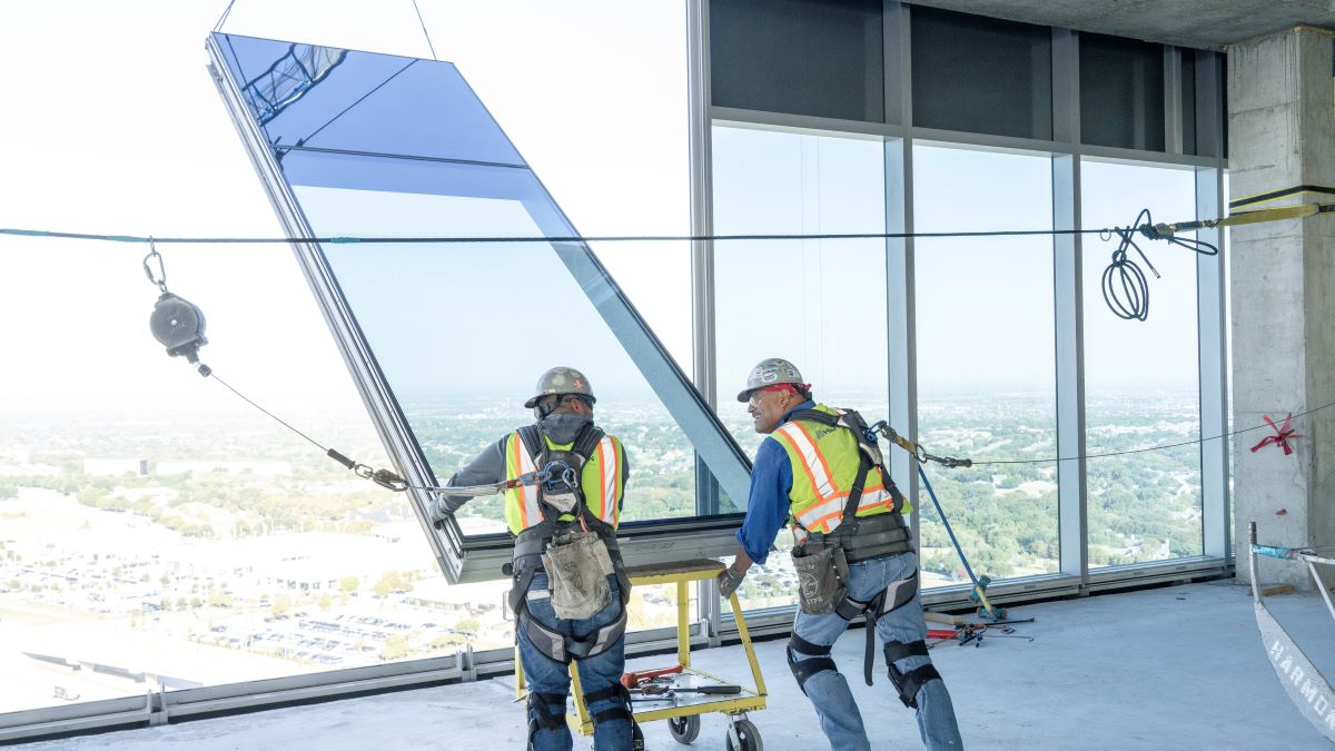 glaziers installing curtain wall