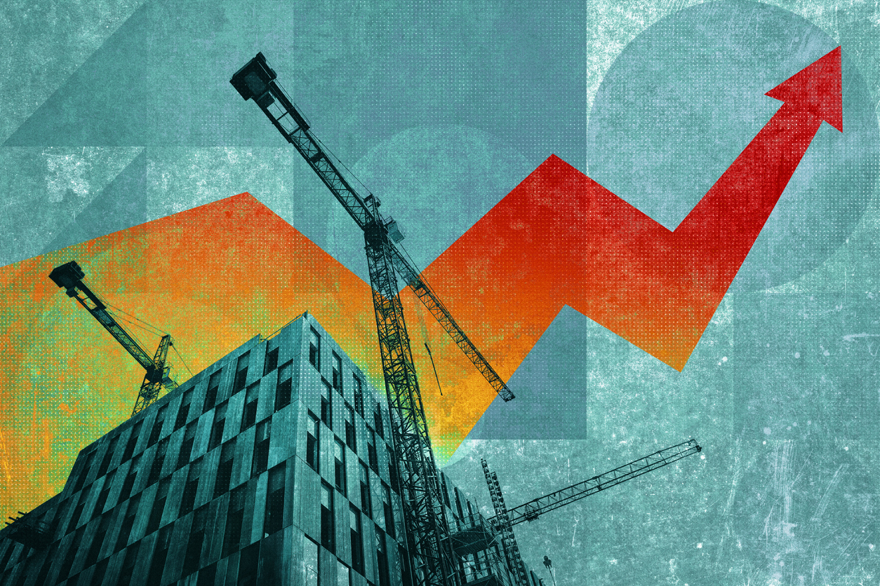 commercial building underneath upward chart line